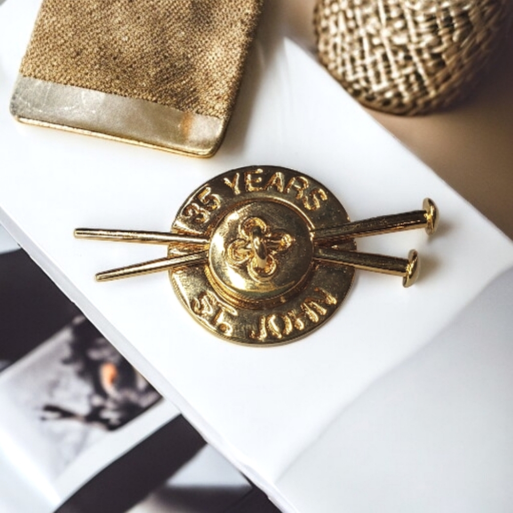 ST JOHN Anniversary Button Nail Brooch